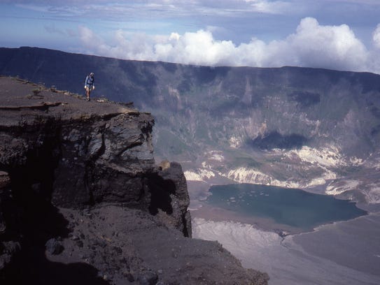 Sulphuric gases rise from the crater of Mt. Tambora