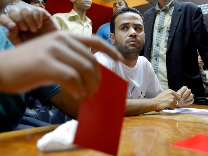 Mahmoud Badr, a leader of the Tamarod movement calling for the ouster of Egypt's president, talks at a press conference on June 29 in Cairo.