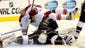 Sept. 15: Coyotes center Tim Kennedy (34) crashes into Kings goalie Mathieu Garon (29) during the first period in Los Angeles.