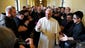 Pope Francis greets seminarians as he walks the loggia