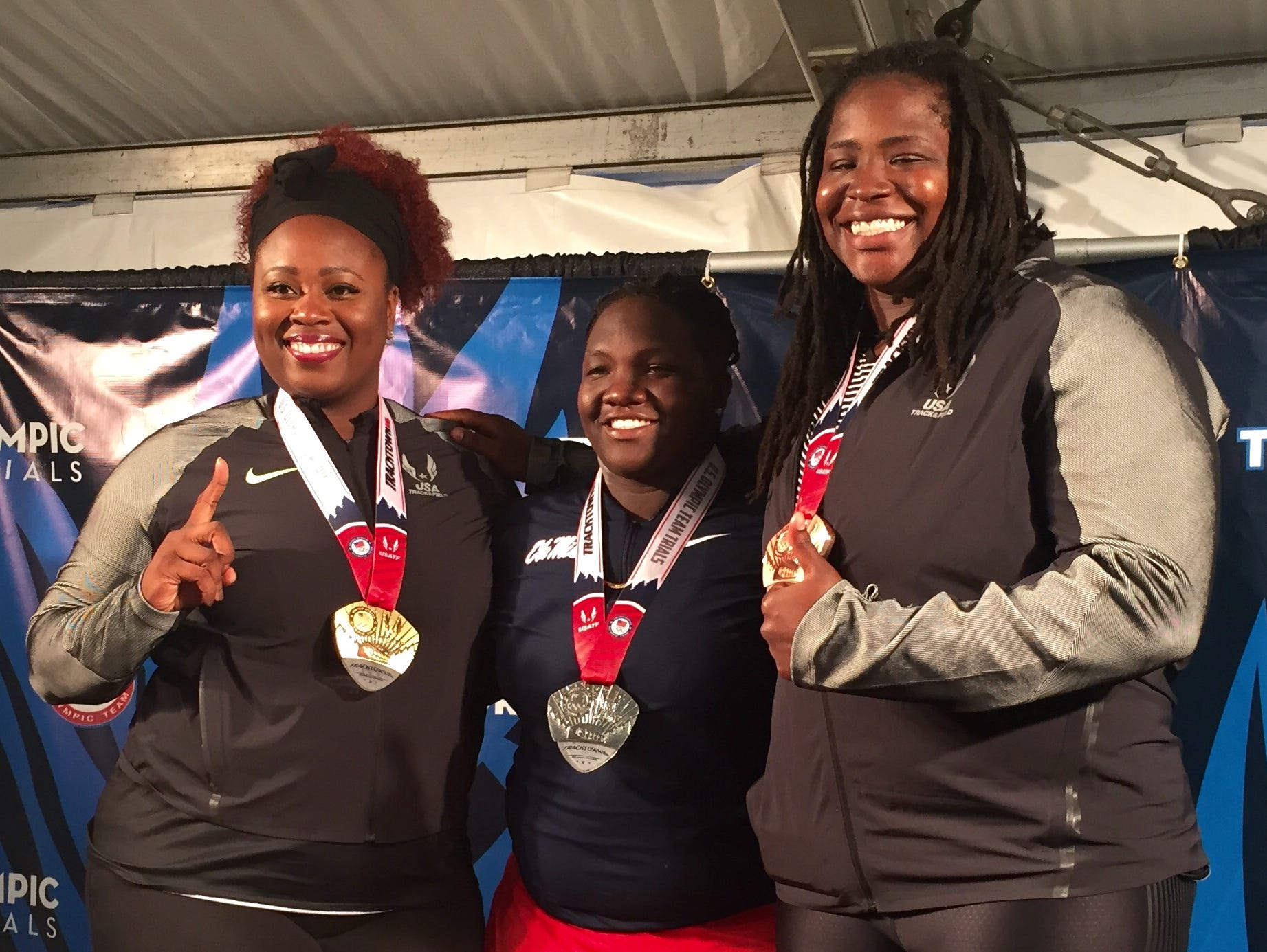 Felisha Johnson made the Olympic team with winner Michelle Carter, left, and Raven Saunders.