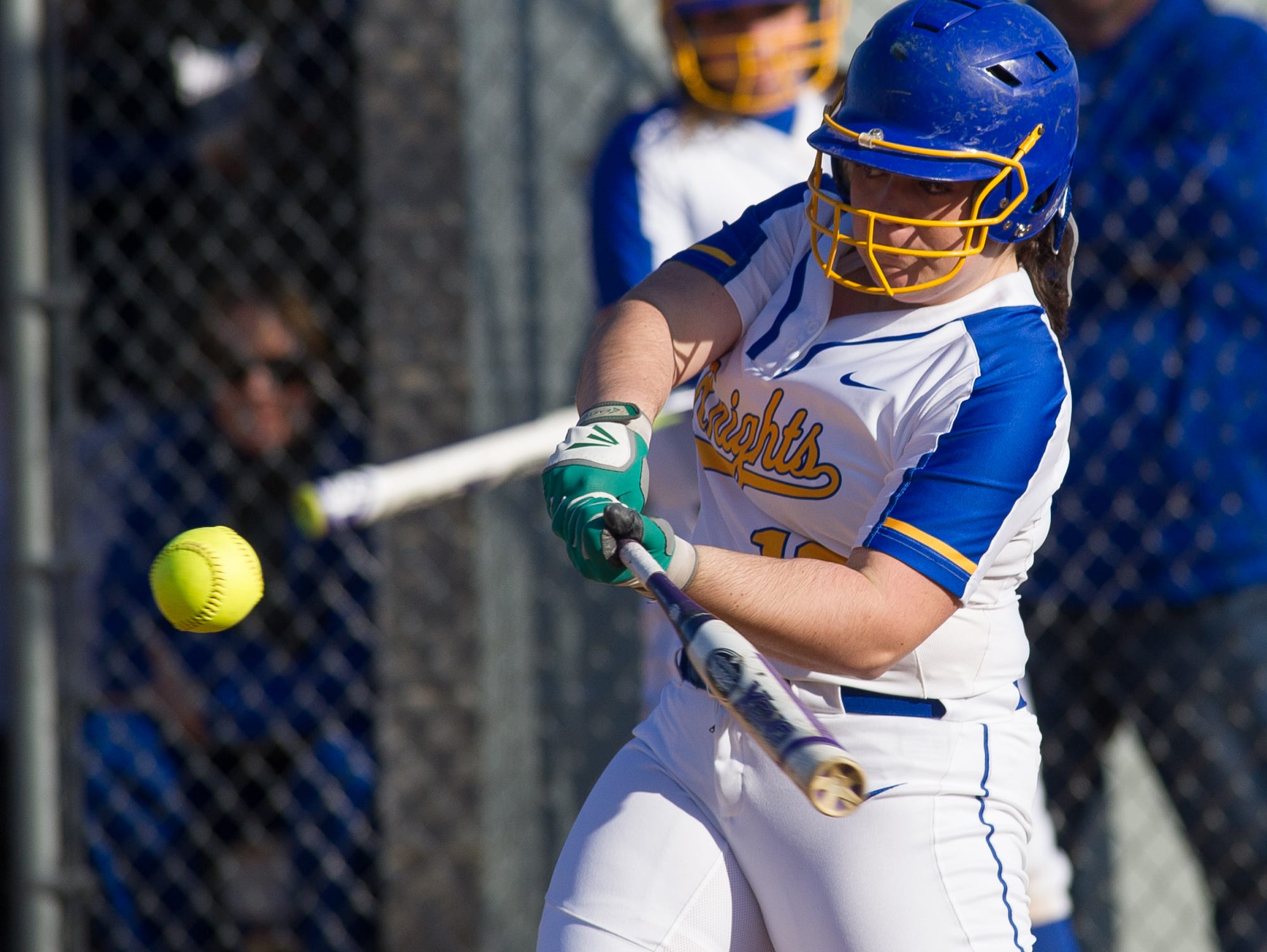 Sussex Central's Taylor Evick (12) takes a swing at a pitch in their game against Sussex Tech.