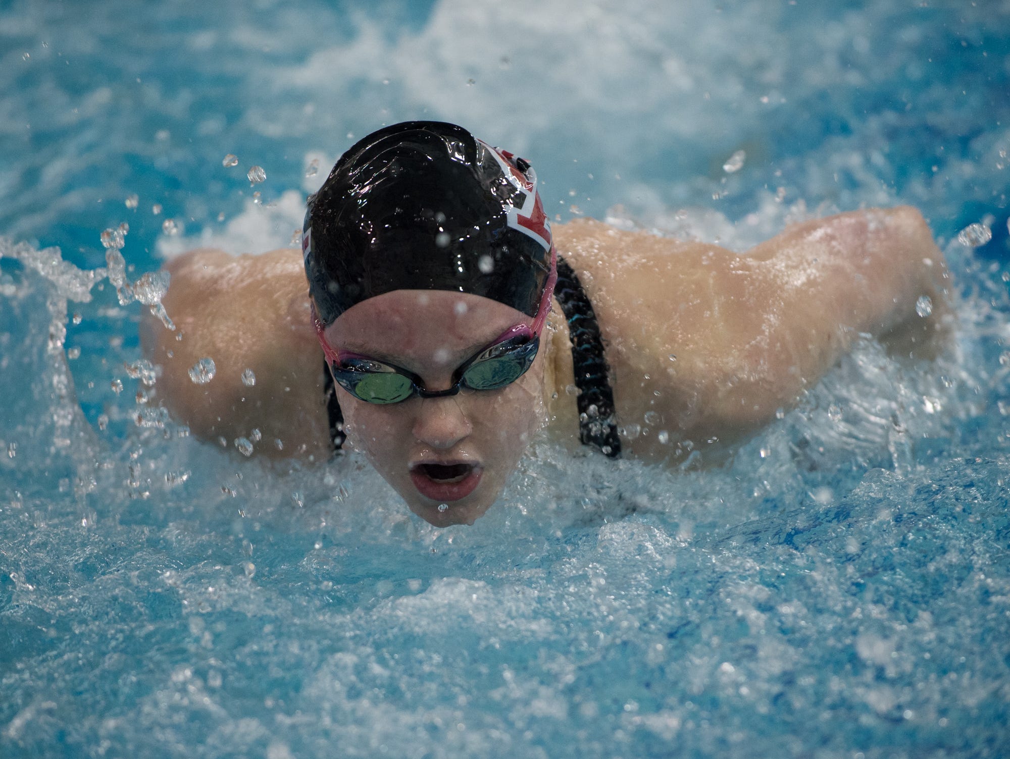 Ursuline Academy's Marie Dickson competes in the 200 yard individual melody final at the girl's DIAA swimming and diving championships at the University of Delaware.
