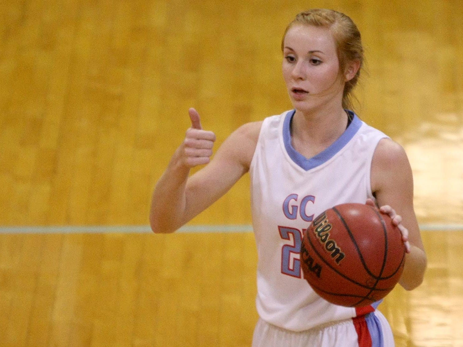 Gibson County's Allie Smithson (21) signals to her teammates against Westview at Bo Booth Gymnasium in Dyer on Saturday.