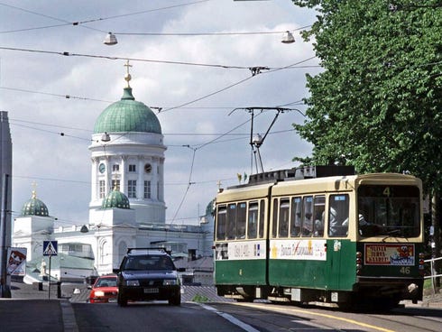 City traffic passes the Lutheran cathedral in Helsinki, Finland. Lose your wallet in this capital and you are most likely to have it returned to you, according to a recent Reader's Digest test of honesty.