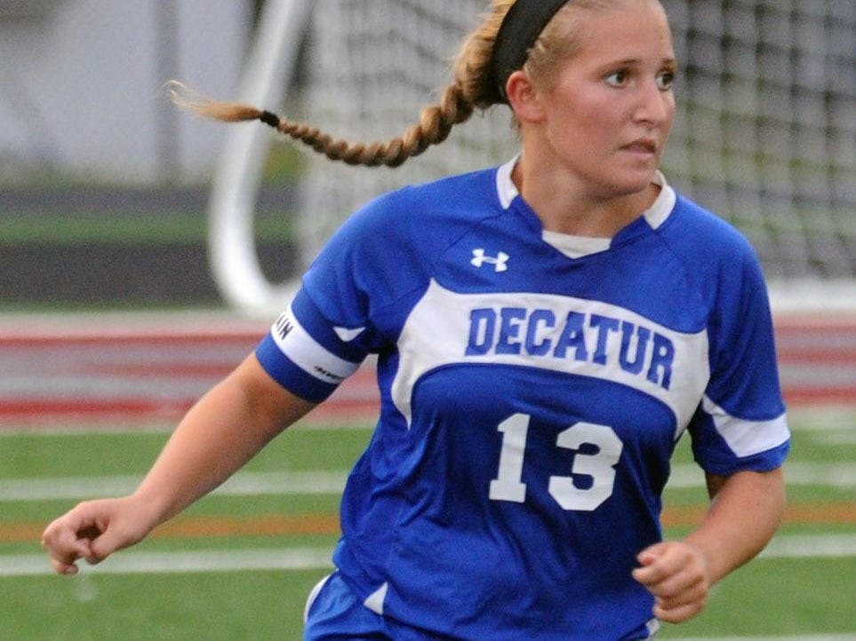 Stephen Decatur senior captain Alexis McDonough works the ball up the field against Snow Hill on Monday.