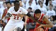 Louisville forward Deng Adel (22) tries to steal the