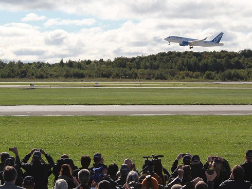 Bombardier's new CSseries aircraft is shown in Mirabel, Quebec, after taking on its maiden flight on Sept. 16, 2013.