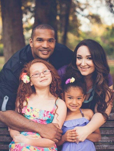 Kenika (L) and Ashley (R) Ng pose with Kenika's two daughters from a previous marriage. Ashley Ng shared this with News10 on Wednesday, Oct. 30, 2014.