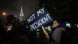 A woman takes part in a protest against President-elect