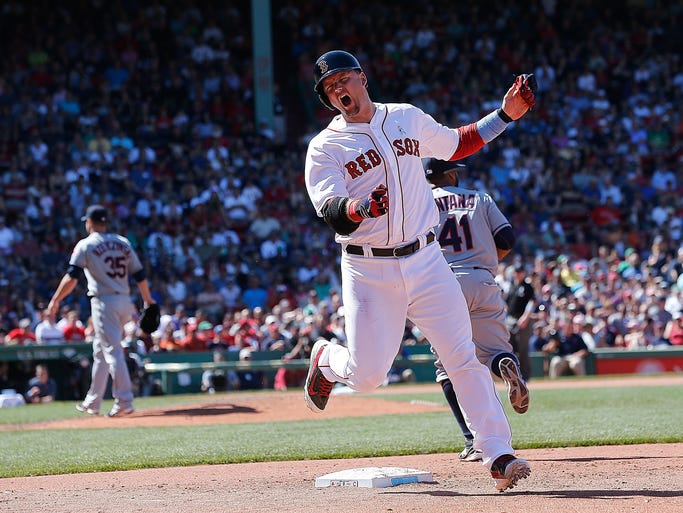 BOSTON, MA - JUNE 15: A.J. Pierzynski #40 of the Boston Red Sox reacts after grounding into a double play against the Cleveland Indians in the sixth inning at Fenway Park on June 15, 2014 in Boston, Massachusetts. A run scored on the play.