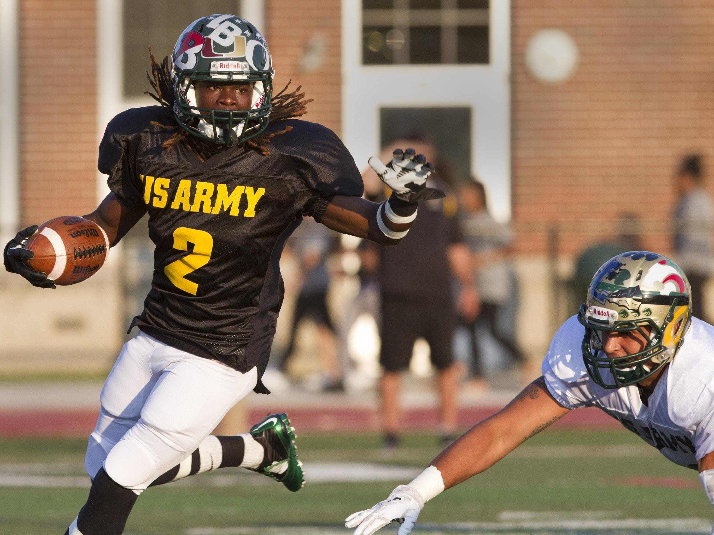 Long Branch’s Dahmiere Willis gains yards in the first half of the 2015 U.S. Army All-Shore Gridiron Classic at Long Branch High School on Thursday.