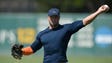 Tim Tebow shows off his arm and defense during the