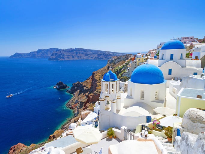 The Greek island of Santorini is dotted                                                           with