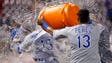 May 24: Royals catcher Salvador Perez dumps a bucket