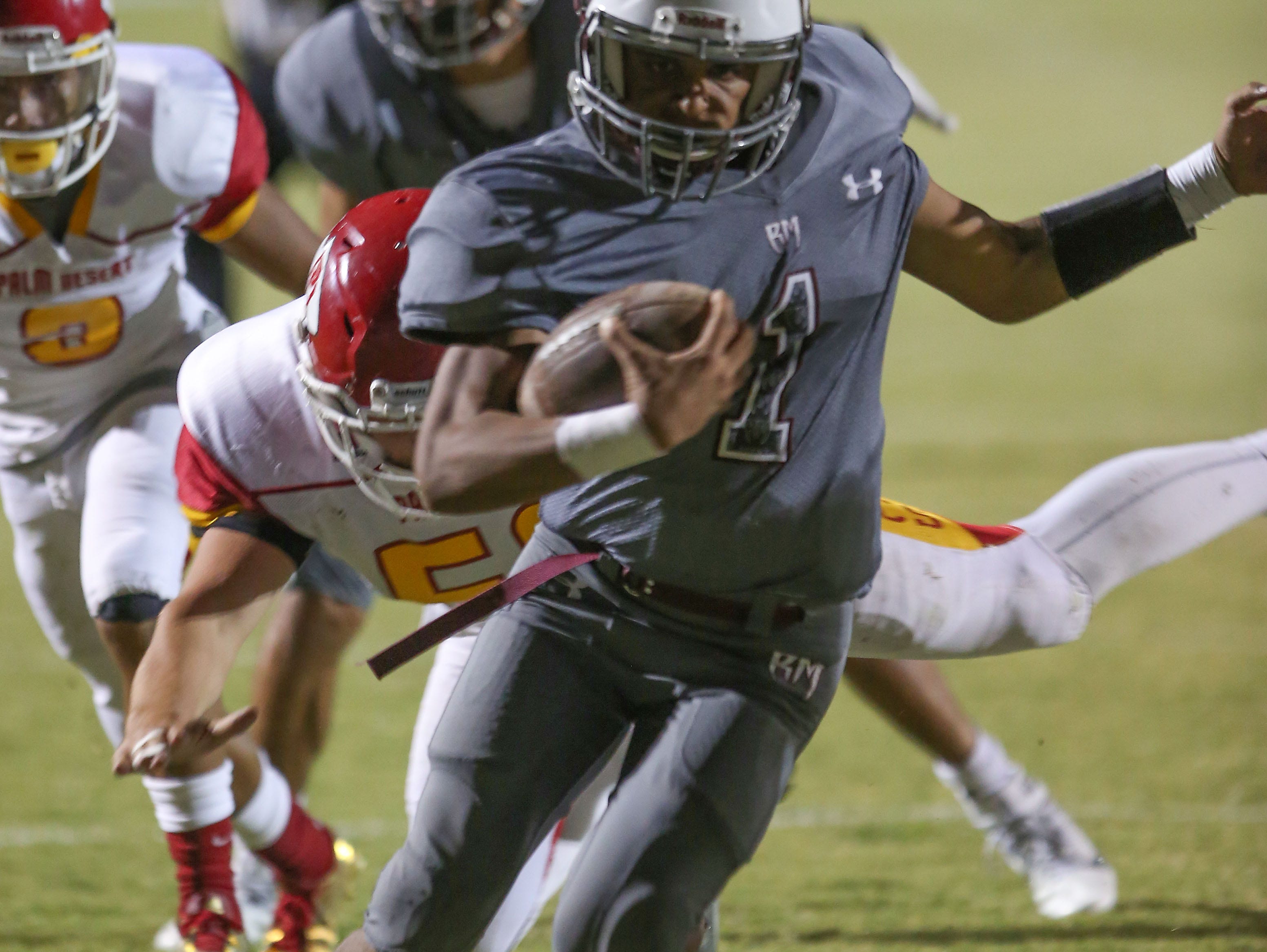 Marquus Prior of Rancho MIrage runs the ball for a touchdown against Palm Desert, September 15, 2016.