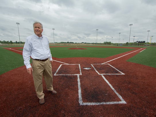 Westfield Mayor Andy Cook stands near home plate on