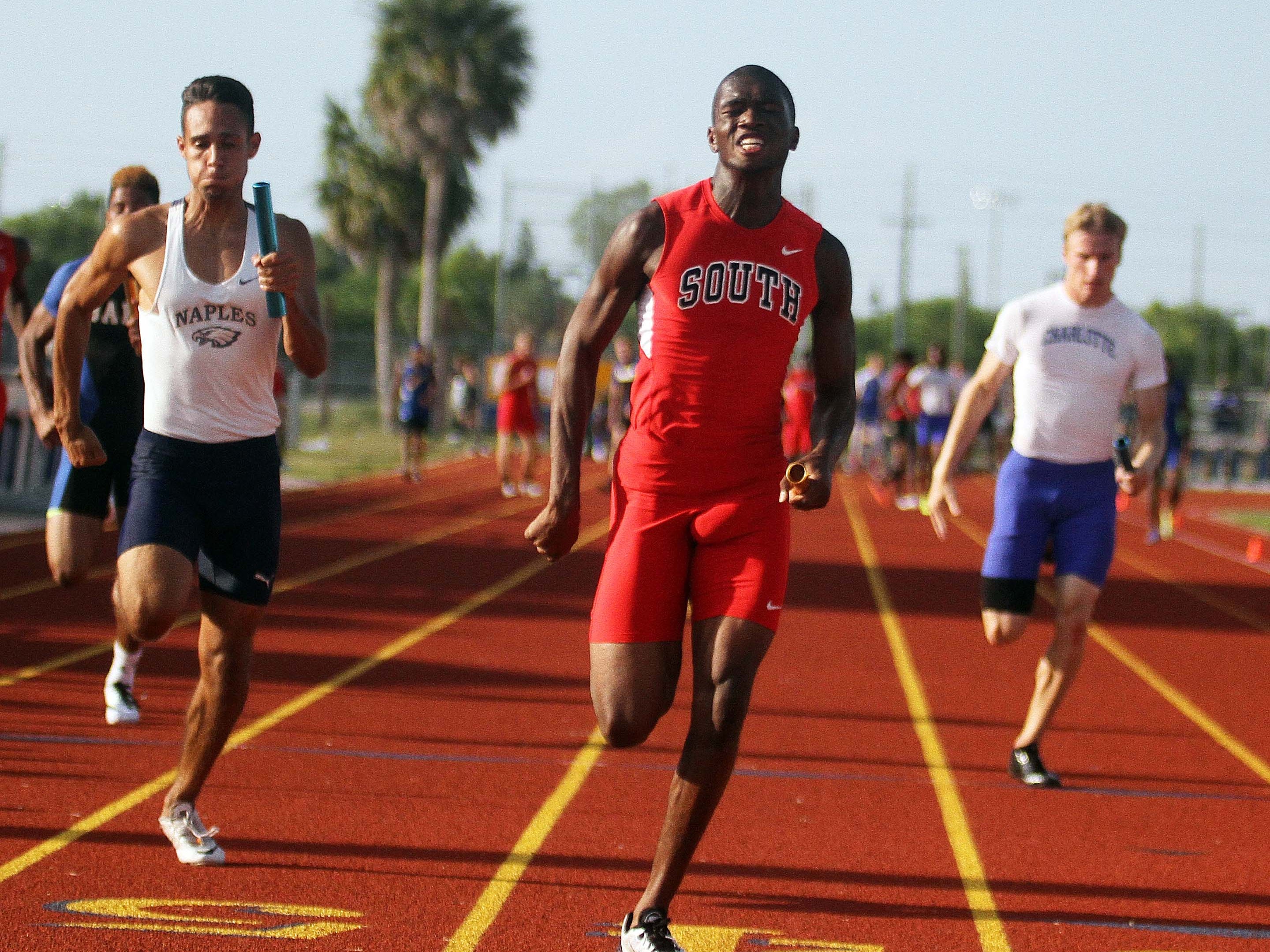 Antonio Wimbush anchors the winning South Fort Myers 400-meter relay team Thursday at the Region 3A-3 track meet at Charlotte High School. The Wolfpack ran a school- and season-best 40.99 seconds.