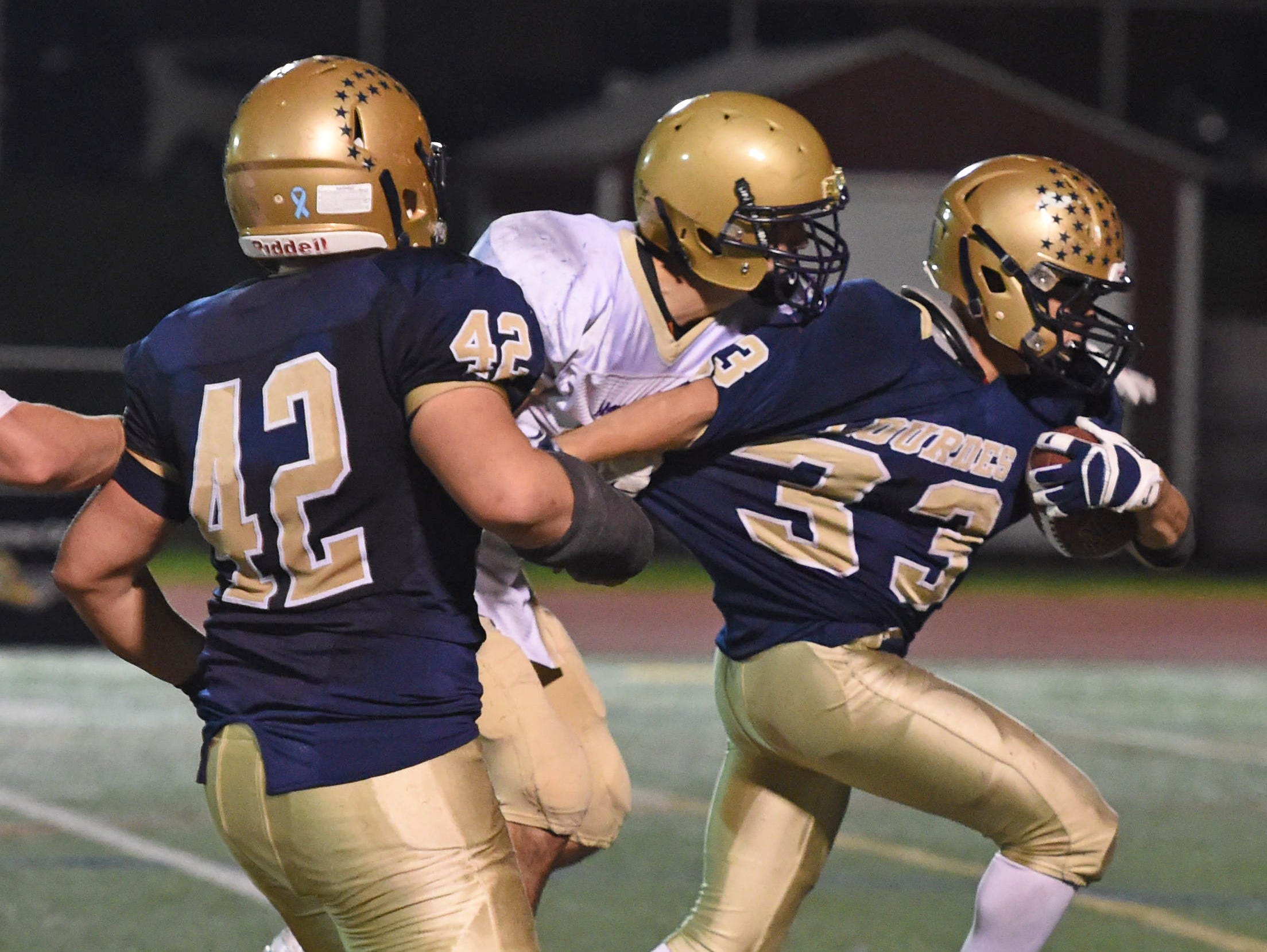 Action from the Class A semi final between Lourdes and Amsterdam at Dietz Stadium.