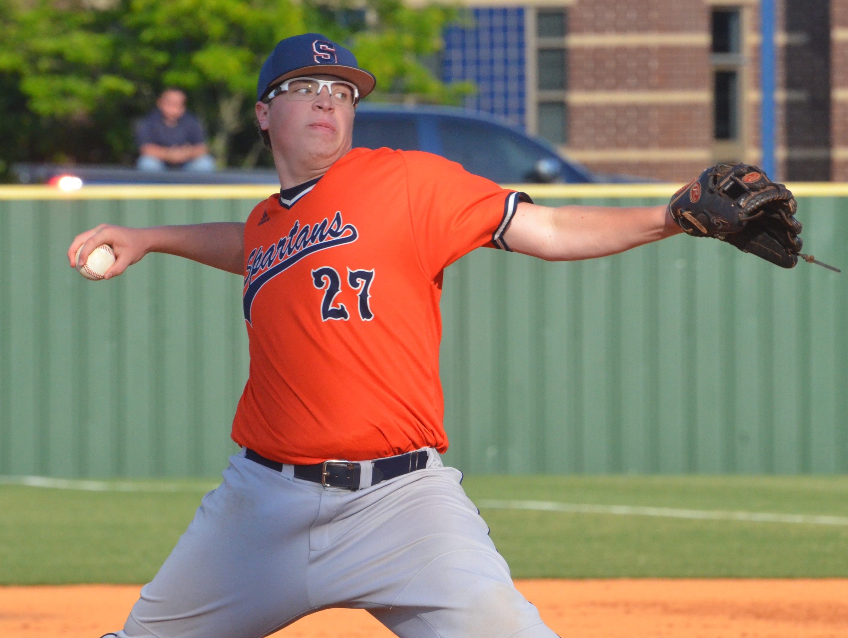 Summit’s Reed Johnson picked up the win in the Spartans’ first state tournament game in school history, striking out eight Siegel batters in Tuesday’s 7-2 victory.