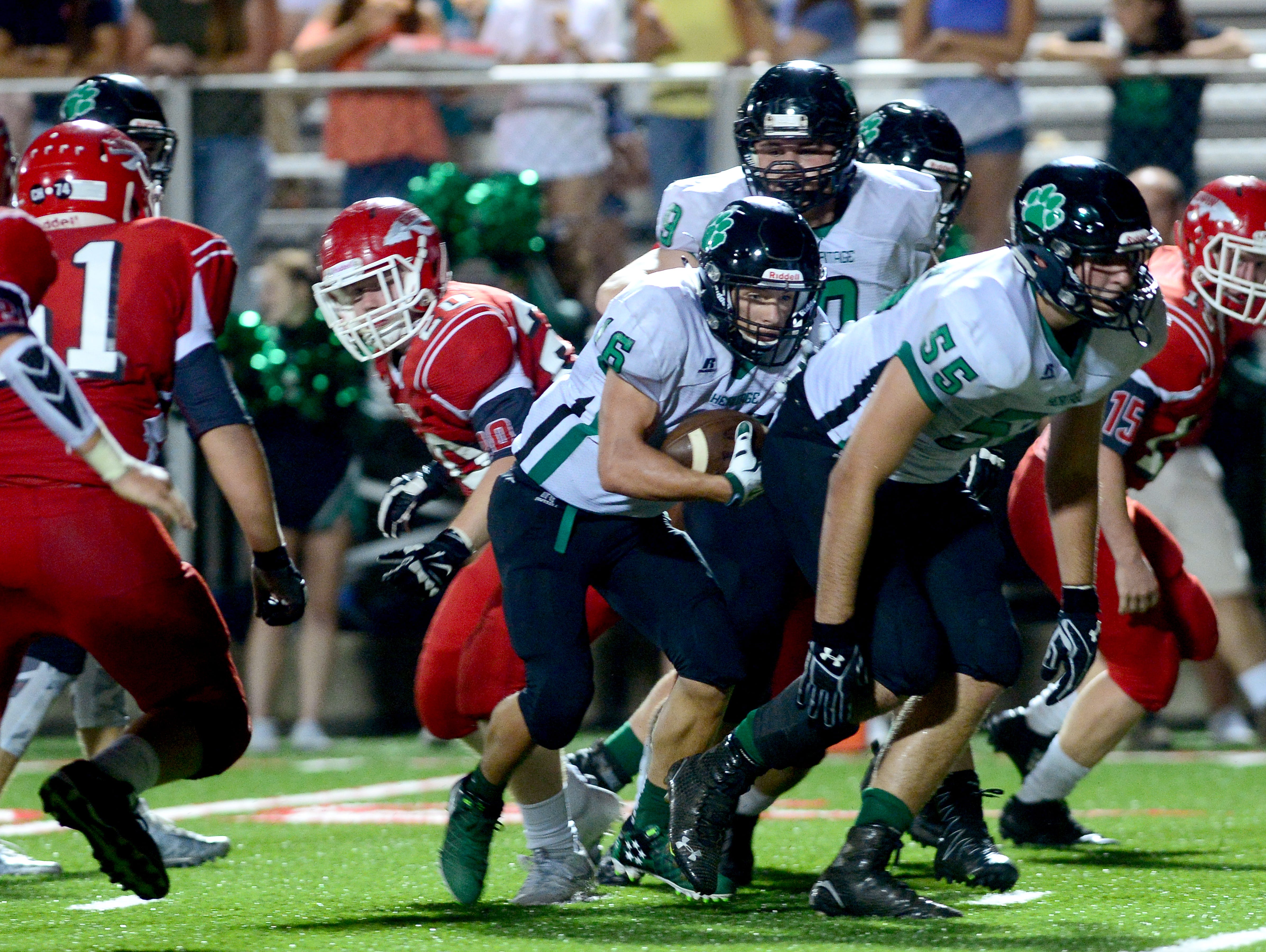 Mountain Heritage Justin Keener (16) rushed for six touchdowns Friday night. The Cougars won at Erwin, 58-31.