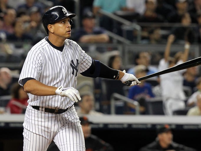 Alex Rodriguez  hits a two-out pitch into the right-field stands in the seventh inning for his MLB-record 24th grand slam on Sept. 20.
