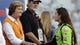 Pat Summitt, left, head coach emeritus of the Tennessee women's basketball team, greets Danica Patrick before the Food City 250 NASCAR Nationwide Series auto race on Friday, Aug. 24, 2012, in Bristol, Tenn. Summitt was the grand marshal of the race.