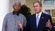 Mandela listens as President Bush speaks in the Rose Garden on Nov. 11, 2001. Mandela visited the White House to offer his condolences after the fatal American Airlines Flight 587 crash and to express his support for U.S. actions in Afghanistan.