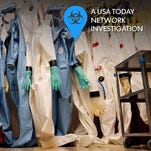 Biohazard suits hang inside a biosafety level 4 laboratory suite at the U.S. Army Medical Research Institute of Infectious Diseases in Fort Detrick, Md., in 2011. The BSL-4 lab, which is the the highest security-level lab possible, is used for handling deadly pathogens that have no vaccine or cure.