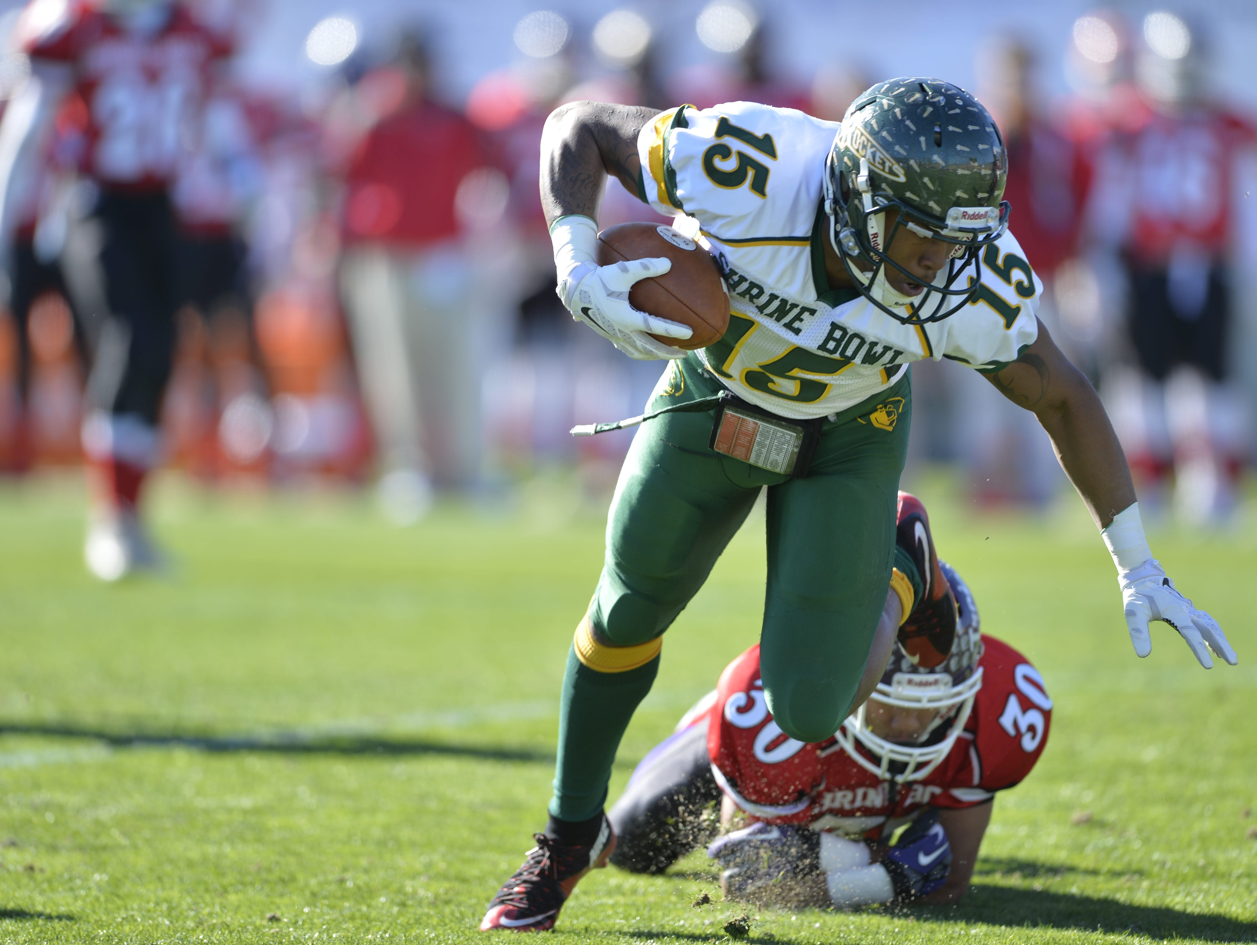 Reynolds' Rico Dowdle (15) scored two touchdowns in Saturday's Shrine Bowl in Spartanburg, S.C.