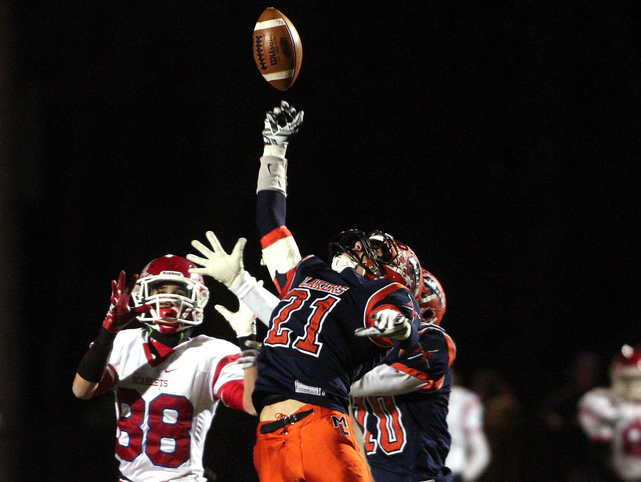 Mountain Lakes' Jake Spagnola knocks down a pass in a NJSIAA North 2 Group II semifinal.