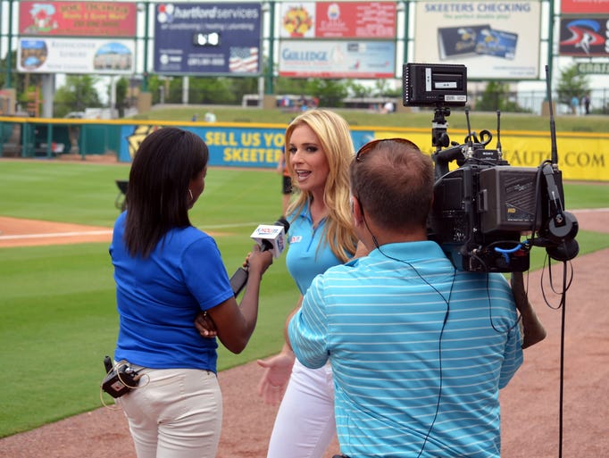 Photos: Chita Johnson throws 1st pitch at Skeeters home opener