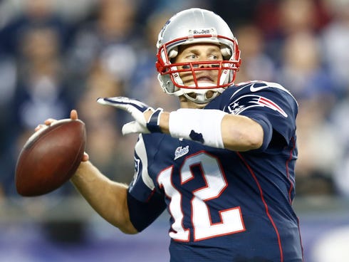 New England Patriots quarterback Tom Brady (12) passes the ball against the New Orleans Saints during the second half at Gillette Stadium in Foxborough, Mass. on Oct. 13, 2013.