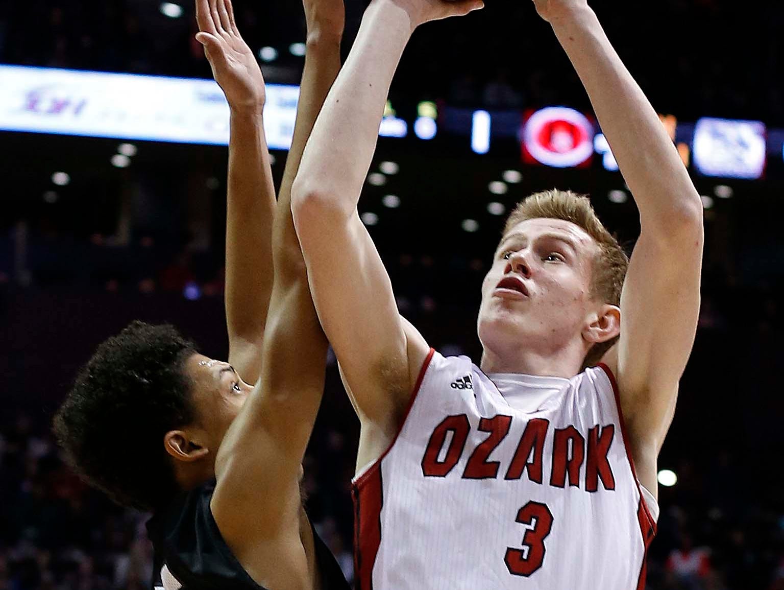 Ozark's Quinn Nelson shoots against Willard in the Gold division final at JQH Arena on December 29, 2016.