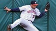July 18: Astros center fielder Carlos Gomez catches