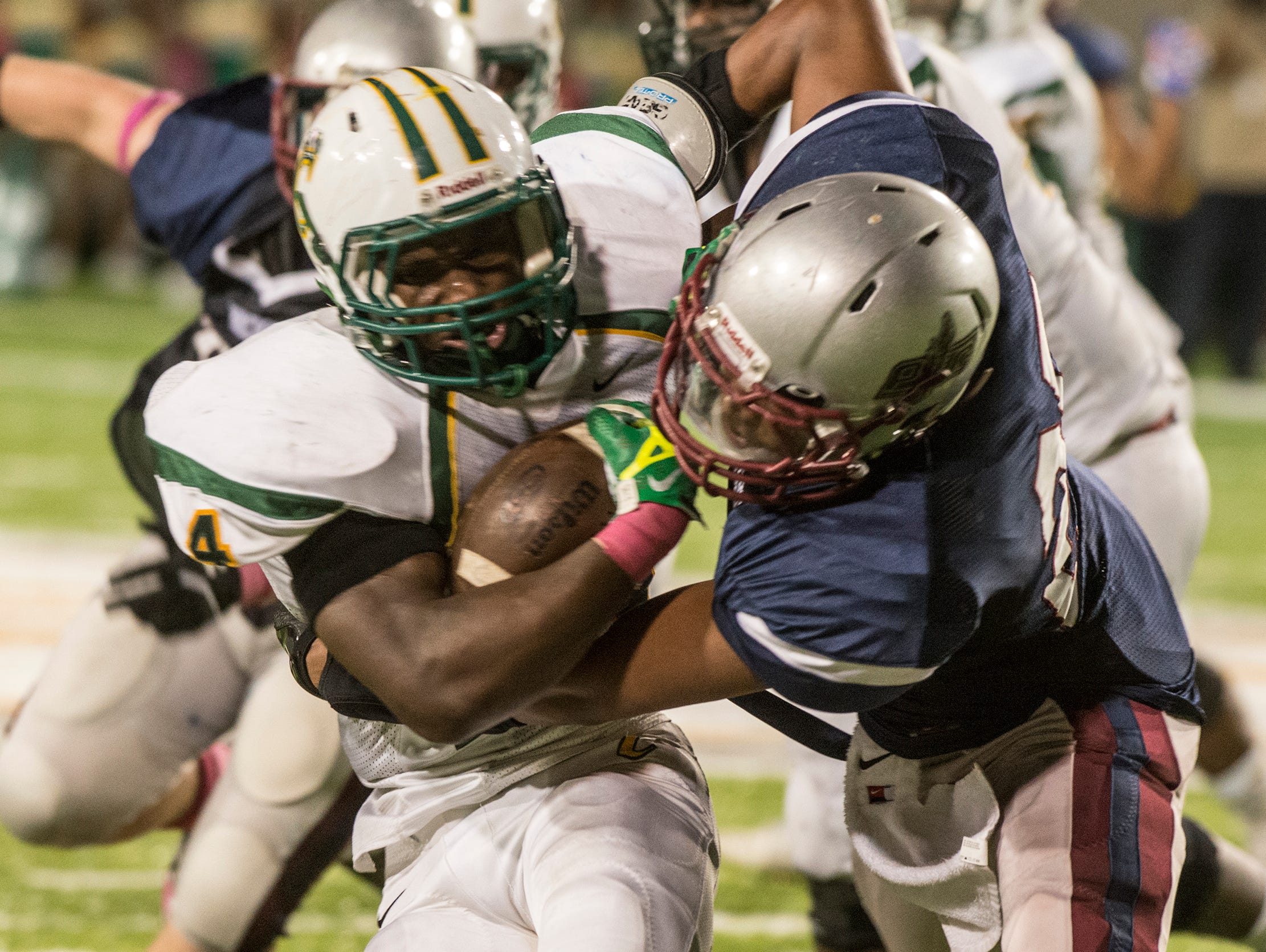 Carver running back Justin Lewis tries to break free on a run. Park Crossing takes on Carver on Friday, Oct. 9, 2015, at Cramton Bowl in Montgomery.