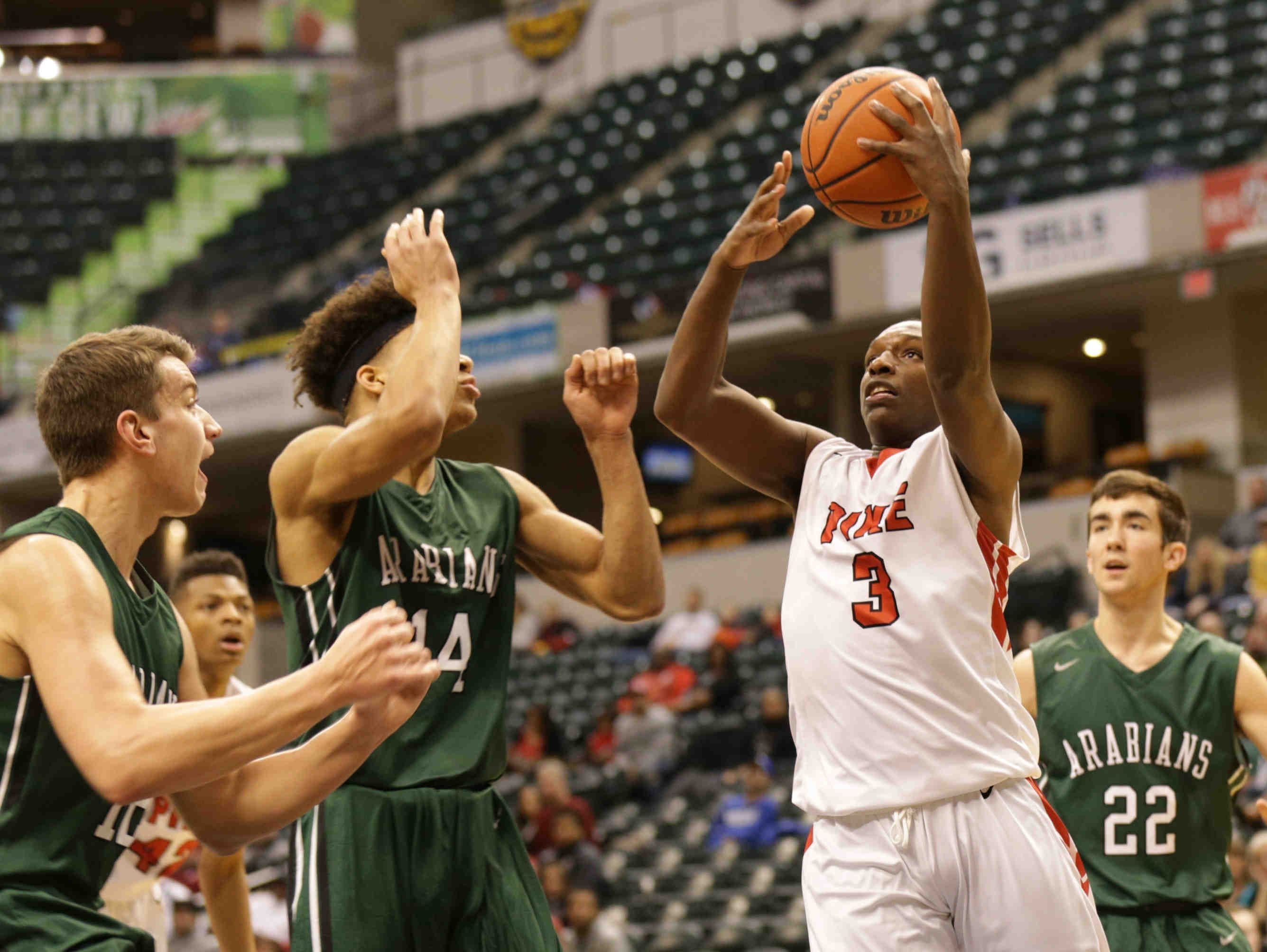 Pike High School's Justin Williams (3) is fouled during "The Really Big Basketball Show, 2017", held at Bankers Life Fieldhouse, Jan 28, 2017. Pendleton Heights High School vs. Pike High School.