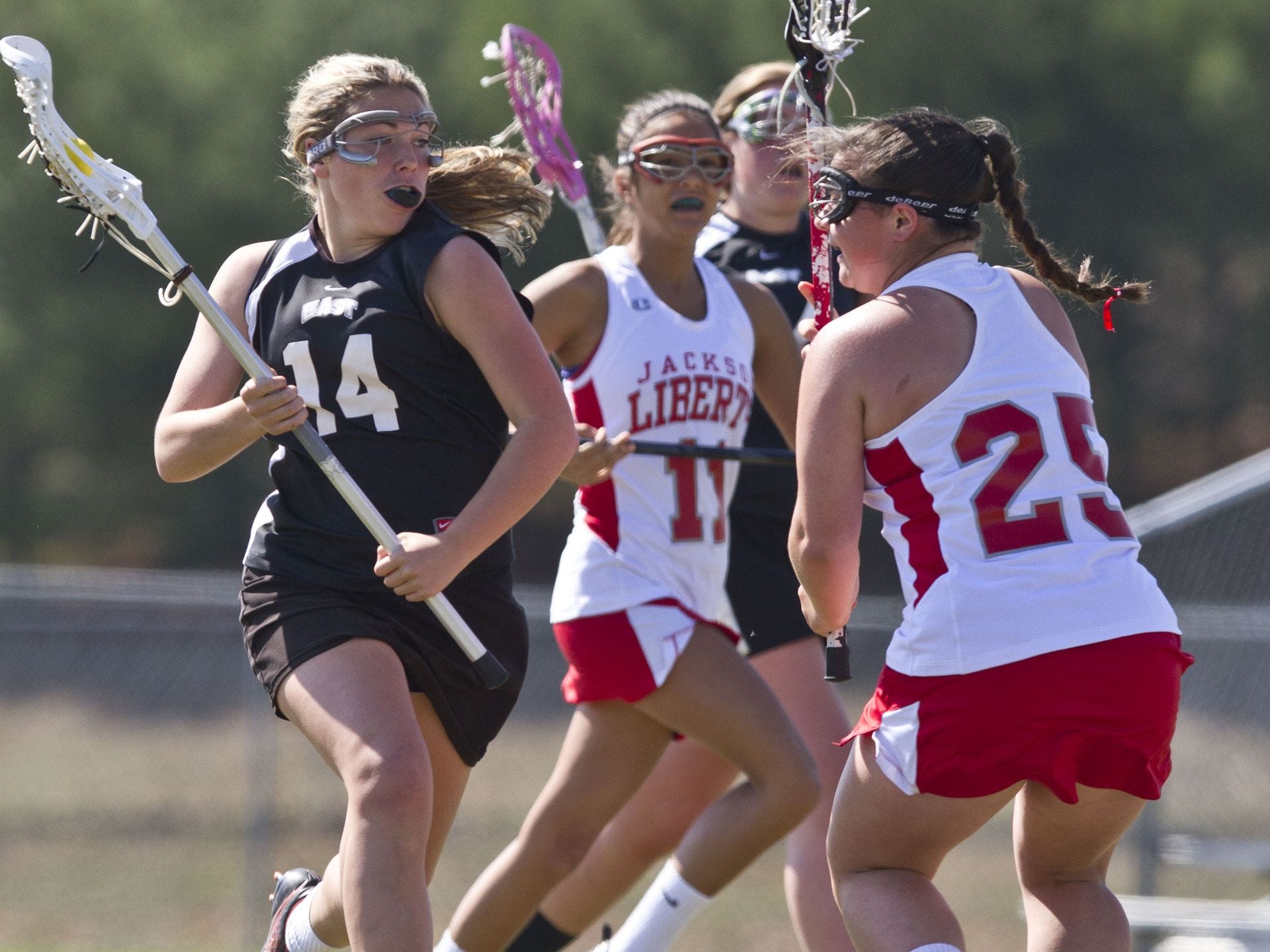 Toms River East's Abbey Gillen drives up the field. Toms River East vs Jackson Liberty lacrosse. Jackson, NJ Saturday, April 19, 2015 Doug Hood/Staff Photographer @dhoodhood Staff Photographer, Gannett