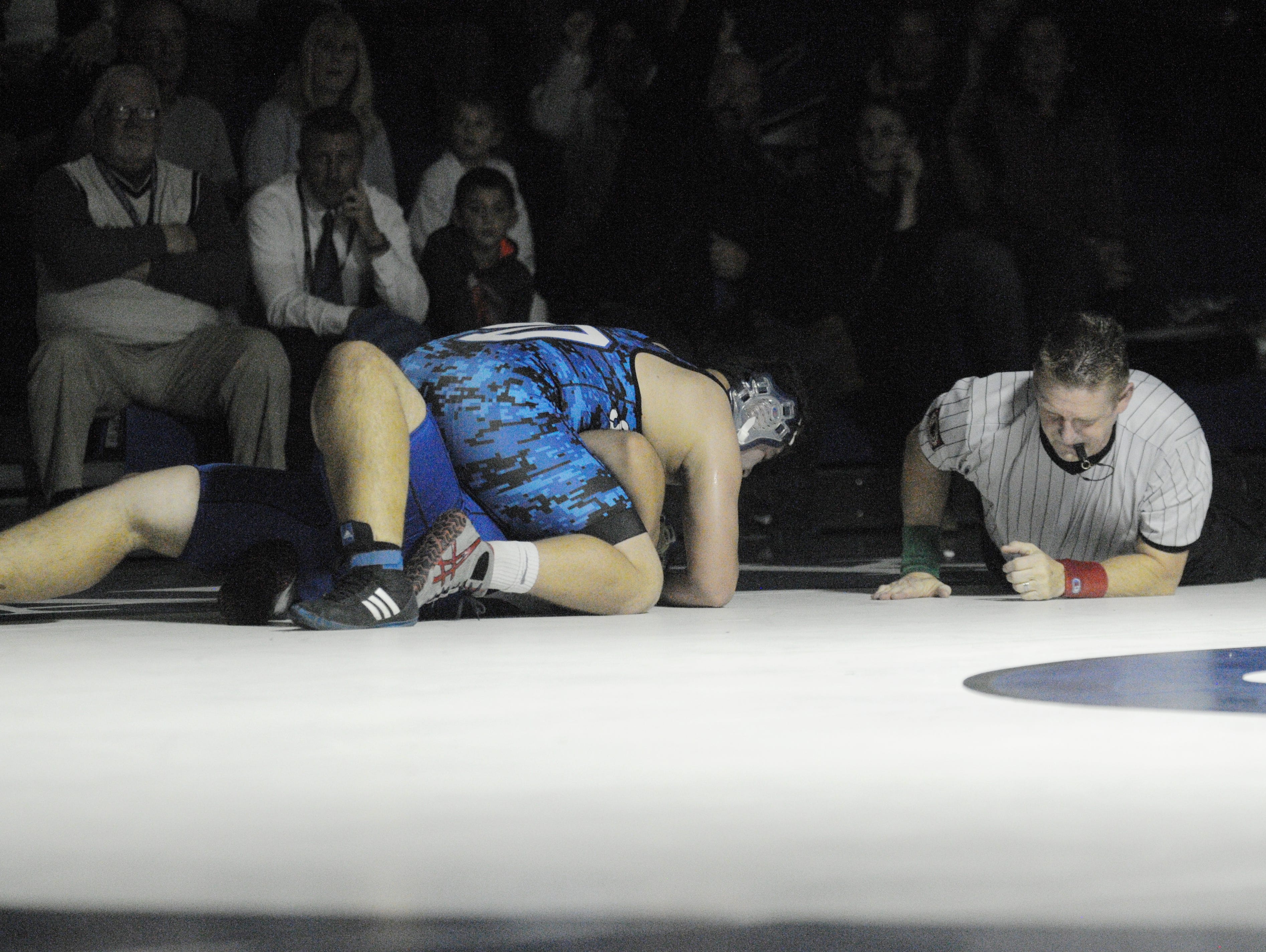 Stephen Decatur's Jian Joobeen pins North Caroline's Jacob Schultz in the last second of the third period of the 285-pound class matchup in Berlin on Wednesday.