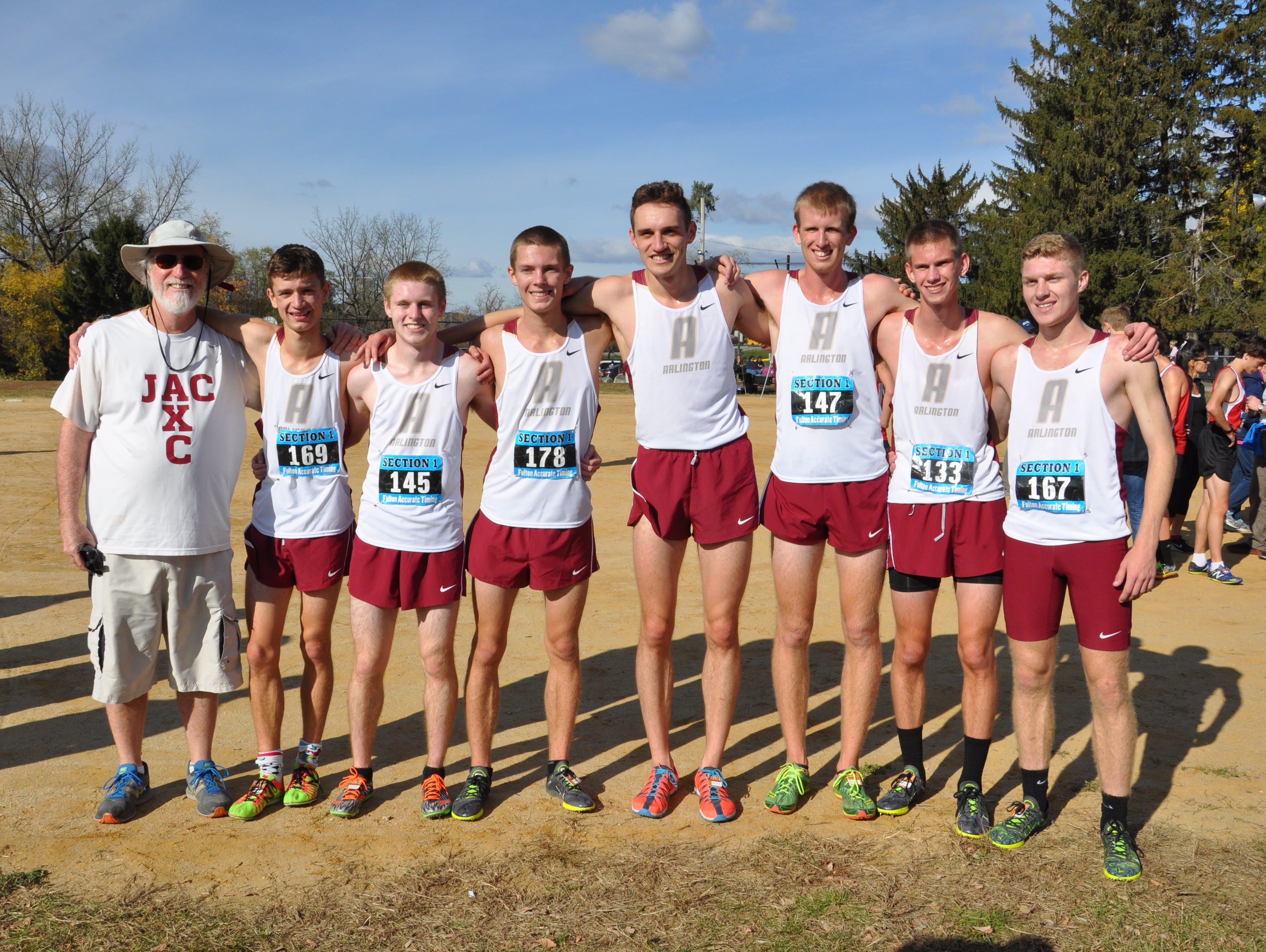 The Arlington High School boys cross country team poses together after winning the Section 1 Class A title at Bowdoin Park on Saturday.