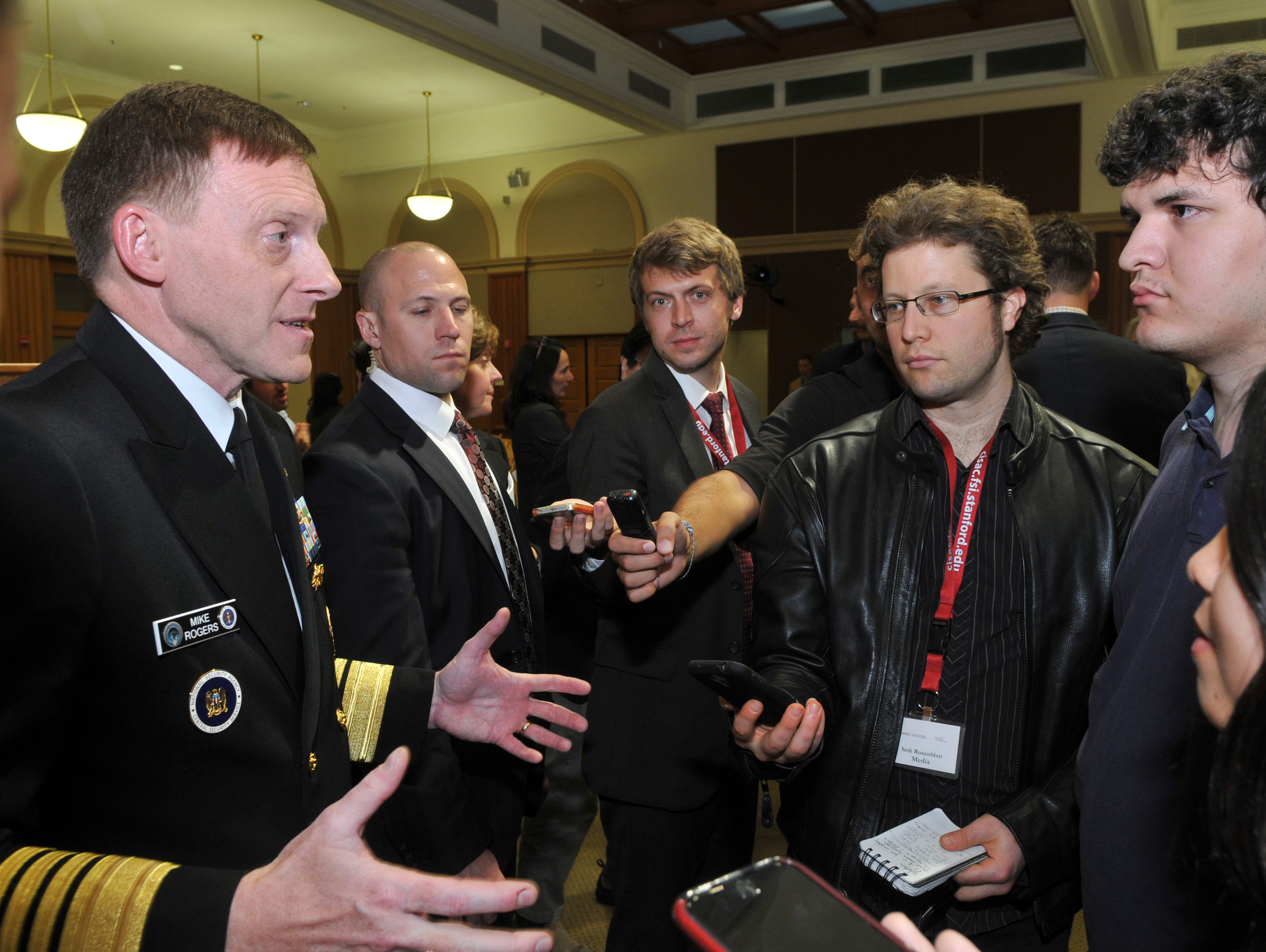 Admiral Mike Rogers, director of the National Security Agency and commander of U.S. Cyber Command, speaking to reporters at an event at  Stanford University.