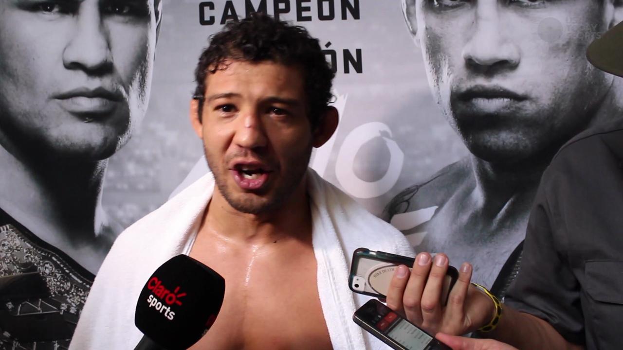 Gilbert Melendez talks with reporters at UFC 188 workouts