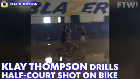 Klay Thompson drills half-court shot on bike