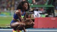 Ashley Spencer (USA) reacts after the women's 400-meter