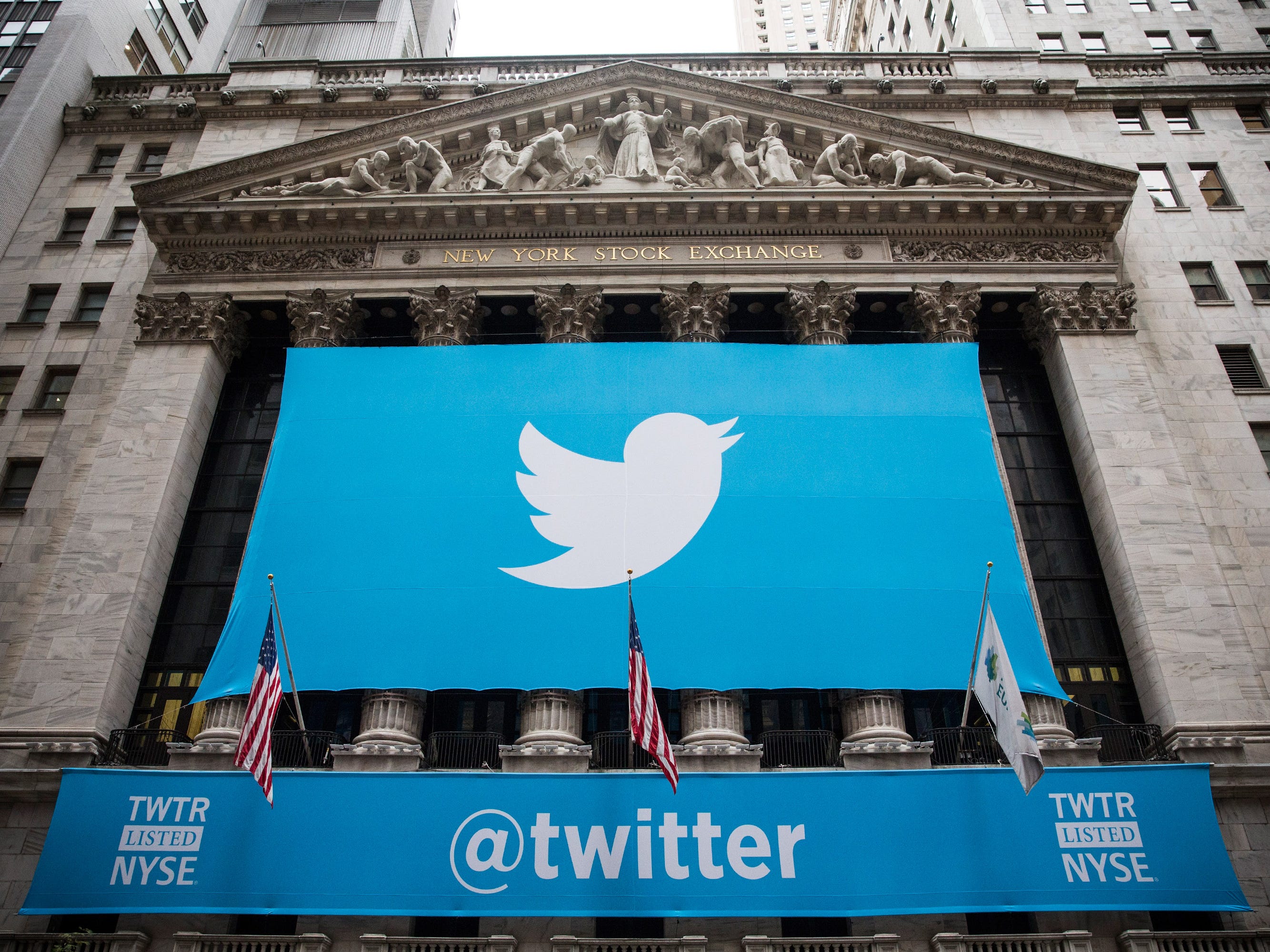 The Twitter logo is displayed on a banner outside the New York Stock Exchange on Nov. 7, 2013.
