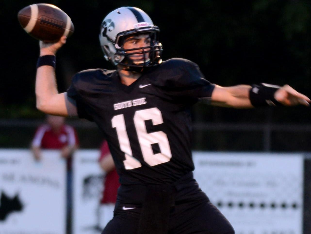 South Side's quarterback Cade Willingham throws a pass during a game last year. Willingham and the Hawks will not play rival North Side in a game that counts this year.