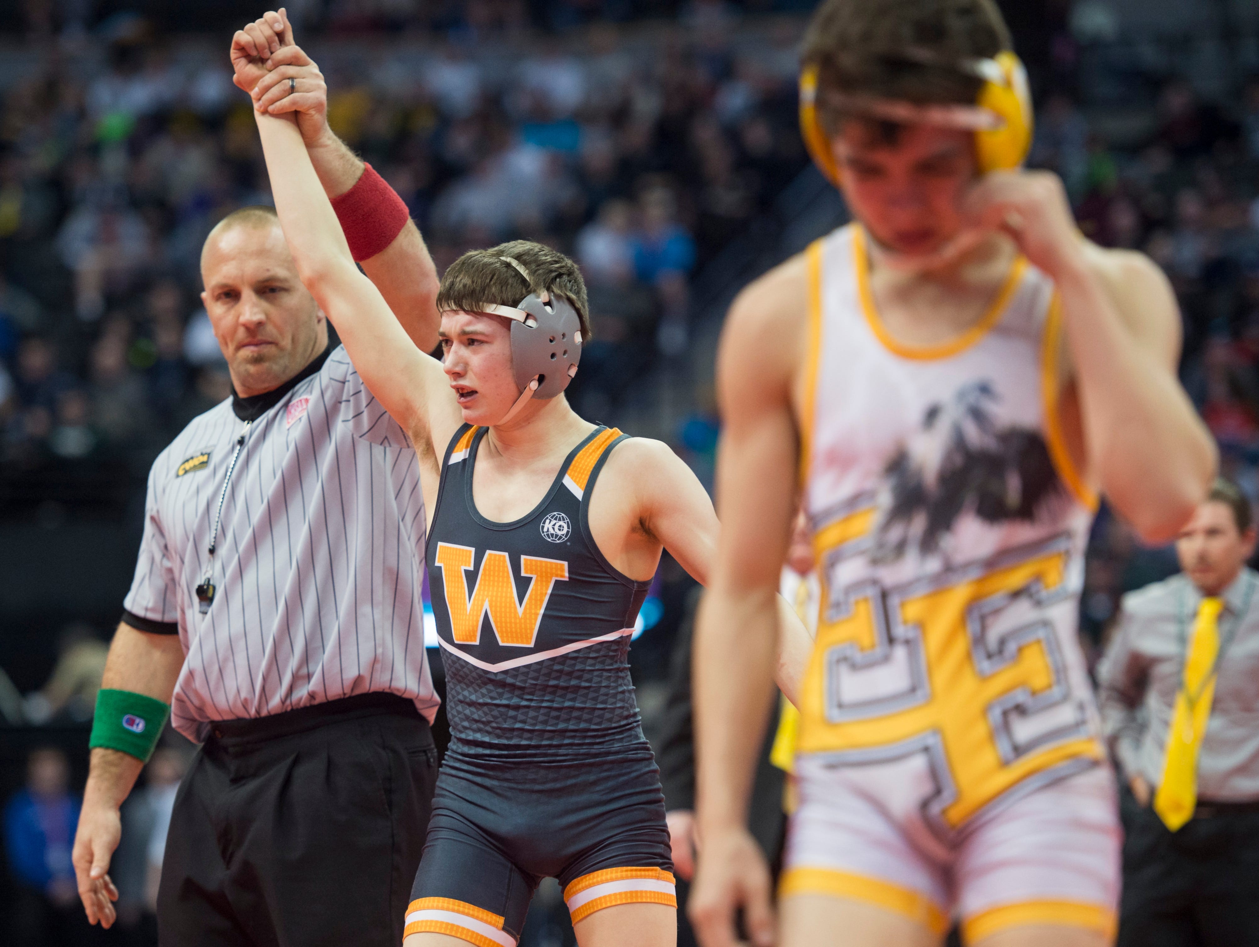 Will Vombaur of Windsor High School is declared champion following his first place match against Andrew Lucero of Pueblo East during the CHSAA state wrestling tournament at the Pepsi Center in Denver Saturday, February 20, 2016. Greenwood walked away with his second state title.