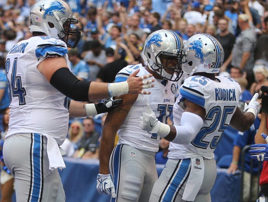 Detroit Lions RB Theo Riddick celebrates his touchdown