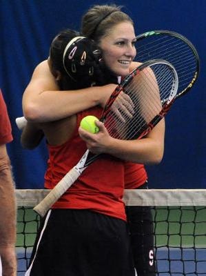 Susquehannock teammates Katie Wagner, facing camera, and Usha Baublitz embrace following their match which saw Wagner win the YAIAA AAA singles championship at Wisehaven Tennis Center on Monday, Oct. 7, 2013. (Jason Plotkin - GameTimePA.com) ID=75250120 ID=75250120