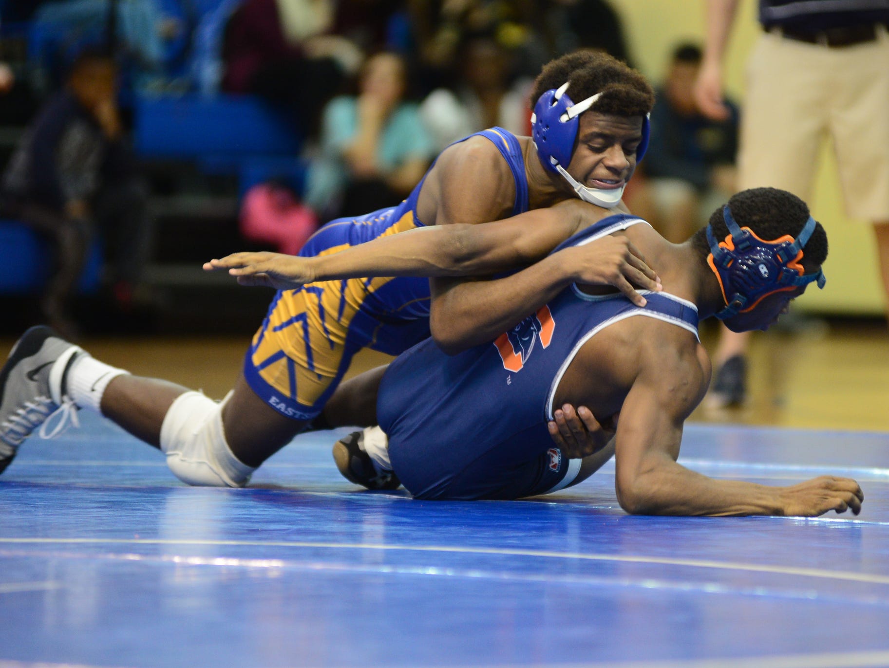 Eastside High's Chance Pride goes up against Qualin Mack-Nesbitt of Chapman during a wrestling match at Eastside Wednesday afternoon.